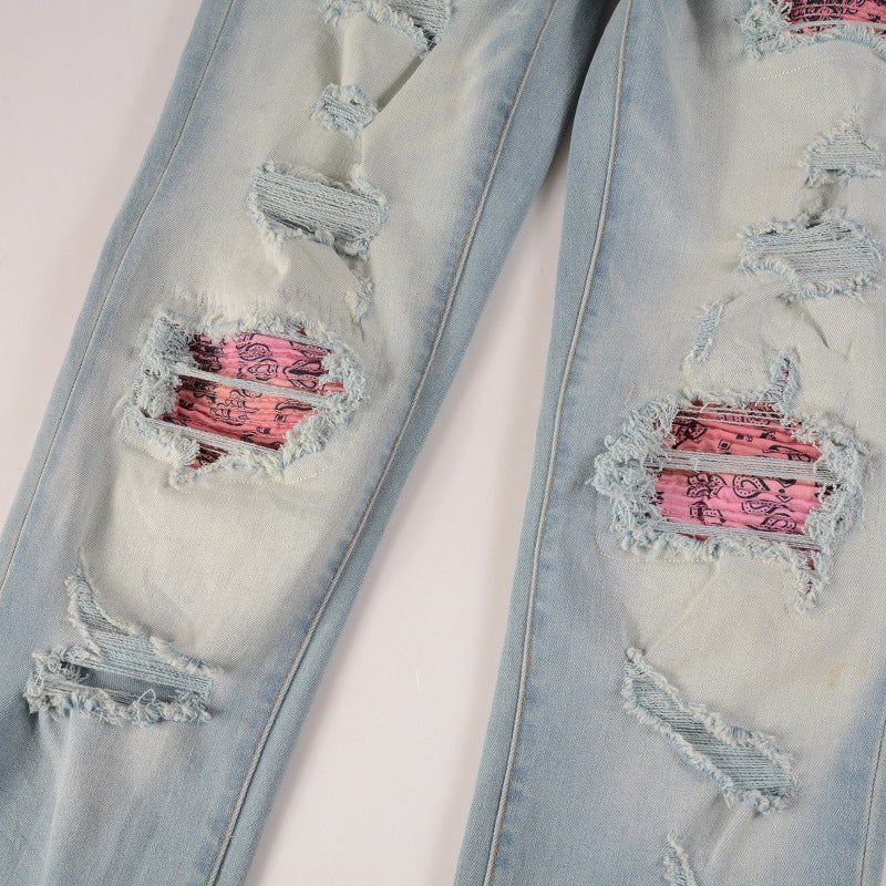 Light color patched ripped jeans