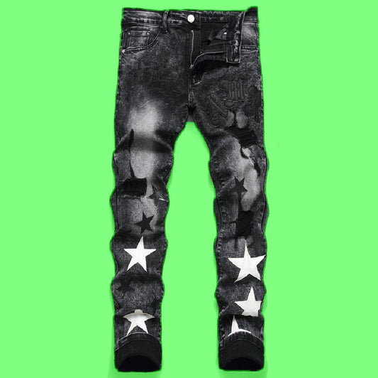 Five-pointed Star patched ripped jean trousers