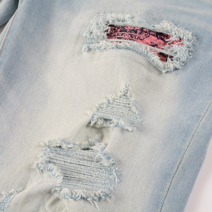 Light color patched ripped jeans