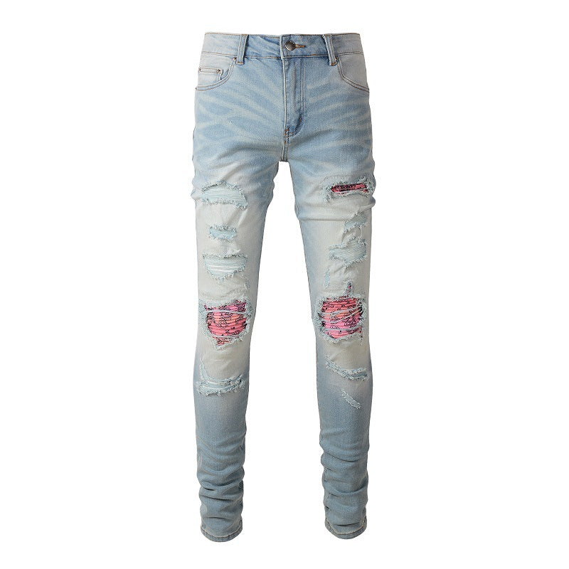 Light color patched ripped jeans